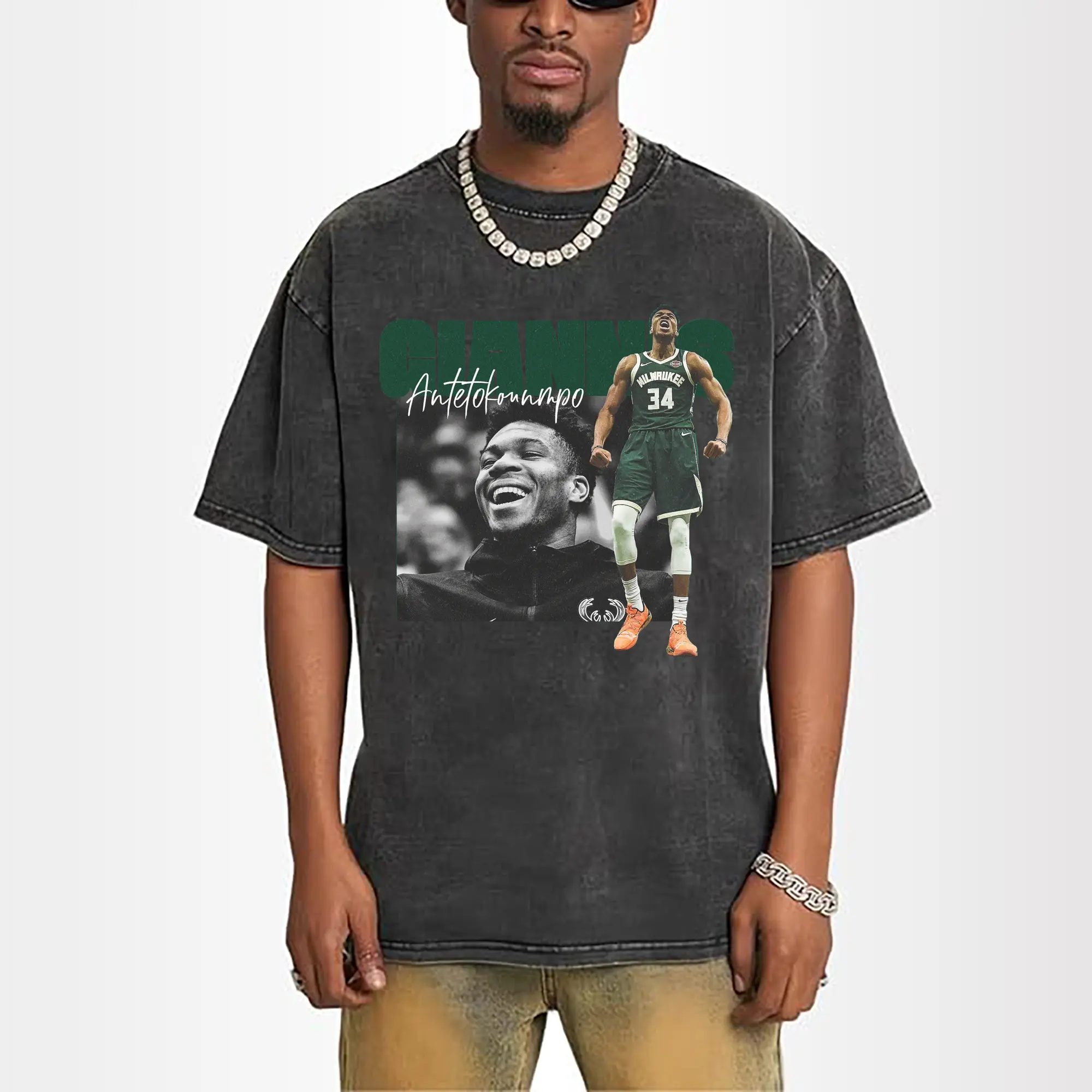 Giannis Antetokounmpo raises his arms to vent